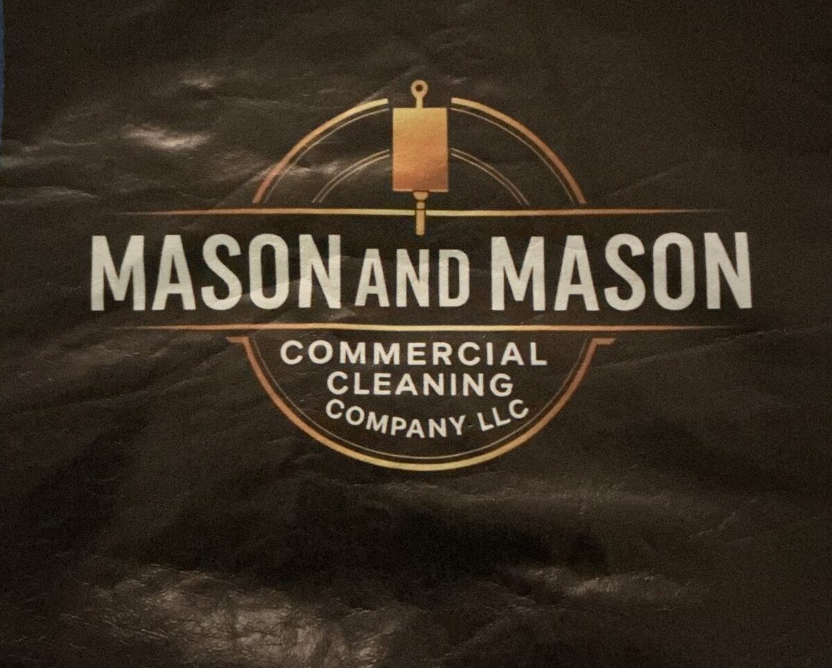 Mason and Mason Commercial Cleaning Company LLC logo photographed on dark fabric